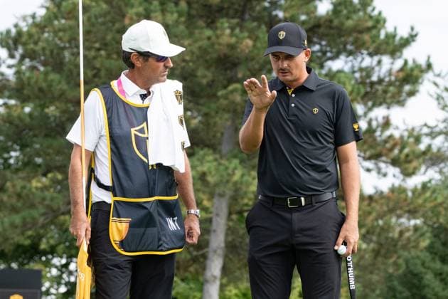 September 27, 2024, Montreal, Pq, CANADA: International team member Christiaan Bezuidenhout of South Africa, talks with his caddy on the first hole during their second round foursome match at the Presidents Cup golf tournament at the Royal Montreal Golf Club, in Montreal, Friday, Sept. 27, 2024. Canada News - September 27, 2024 - ZUMAc35_ 20240927_zaf_c35_109 Copyright: xChristinnexMuschix