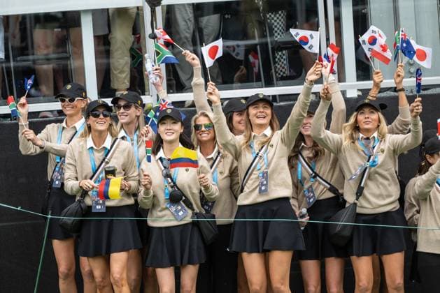 MONTREAL, QC - SEPTEMBER 27: The player wives cheering at the first tee at the 2024 Presidents Cup on September 27, 2024 at The Royal Montreal Golf Club in Montreal, QC (Photo by Vincent Ethier Icon Sportswire) GOLF: SEP 27 Presidents Cup EDITORIAL USE ONLY Icon2409270177