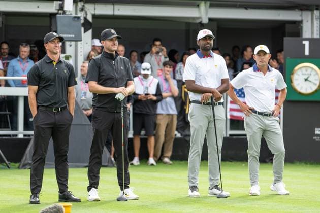 MONTREAL, QC - SEPTEMBER 27: International Team golfer Adam Scott and teammate Taylor Pendrith , Team USA golfer Sahith Theegala and teammate Collin Morikawa at the first tee at the 2024 Presidents Cup on September 27, 2024 at The Royal Montreal Golf Club in Montreal, QC (Photo by Vincent Ethier Icon Sportswire) GOLF: SEP 27 Presidents Cup EDITORIAL USE ONLY Icon2409270503