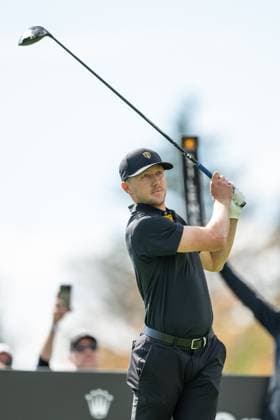 MONTREAL, QC - SEPTEMBER 27: International Team golfer Mackenzie Hughes plays his shot from the second tee at the 2024 Presidents Cup on September 27, 2024 at The Royal Montreal Golf Club in Montreal, QC (Photo by Vincent Ethier Icon Sportswire) GOLF: SEP 27 Presidents Cup EDITORIAL USE ONLY Icon2409271506