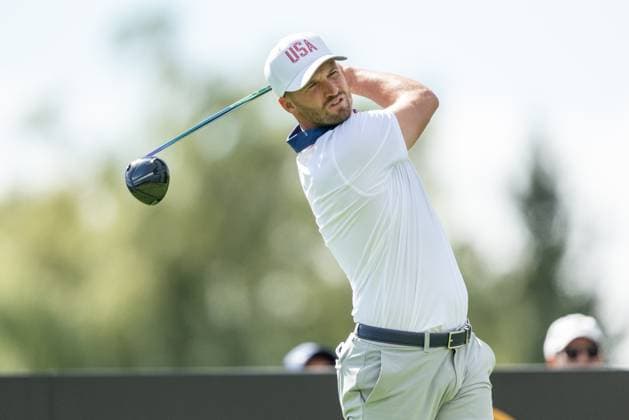 MONTREAL, QC - SEPTEMBER 27: Team USA golfer Wyndham Clark plays his shot from the second tee at the 2024 Presidents Cup on September 27, 2024 at The Royal Montreal Golf Club in Montreal, QC (Photo by Vincent Ethier Icon Sportswire) GOLF: SEP 27 Presidents Cup EDITORIAL USE ONLY Icon2409271591