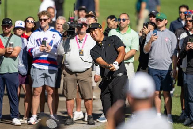 MONTREAL, QC - SEPTEMBER 27: International Team golfer Byeong-Hun An plays his shot from outside of the fairway at the 2024 Presidents Cup on September 27, 2024 at The Royal Montreal Golf Club in Montreal, QC (Photo by Vincent Ethier Icon Sportswire) GOLF: SEP 27 Presidents Cup EDITORIAL USE ONLY Icon2409272067