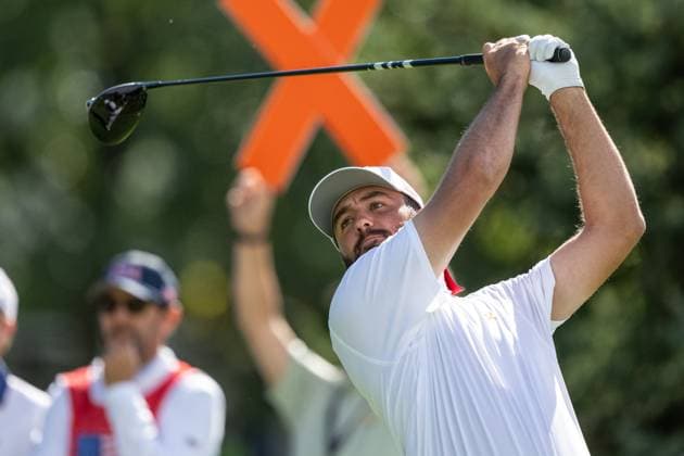 MONTREAL, QC - SEPTEMBER 27: Team USA golfer Scottie Scheffler plays his shot from the fourth tee at the 2024 Presidents Cup on September 27, 2024 at The Royal Montreal Golf Club in Montreal, QC (Photo by Vincent Ethier Icon Sportswire) GOLF: SEP 27 Presidents Cup EDITORIAL USE ONLY Icon2409272160