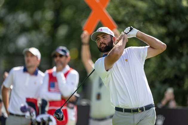 MONTREAL, QC - SEPTEMBER 27: Team USA golfer Scottie Scheffler plays his shot from the fourth tee at the 2024 Presidents Cup on September 27, 2024 at The Royal Montreal Golf Club in Montreal, QC (Photo by Vincent Ethier Icon Sportswire) GOLF: SEP 27 Presidents Cup EDITORIAL USE ONLY Icon2409272188