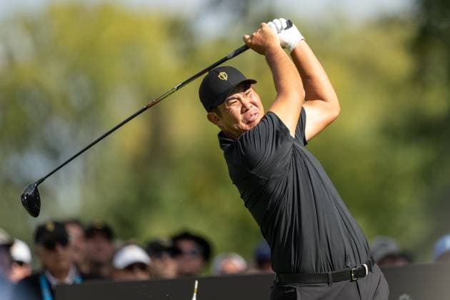 MONTREAL, QC - SEPTEMBER 27: International Team golfer Byeong-Hun An plays his shot from the fifth tee at the 2024 Presidents Cup on September 27, 2024 at The Royal Montreal Golf Club in Montreal, QC (Photo by Vincent Ethier Icon Sportswire) GOLF: SEP 27 Presidents Cup EDITORIAL USE ONLY Icon2409273119