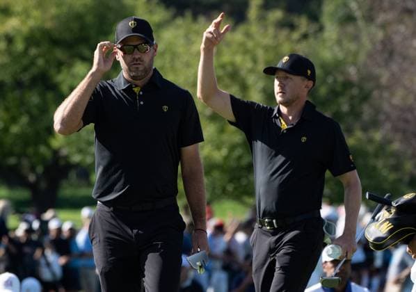 September 27, 2024, Montreal, Pq, CANADA: International team members Mackenzie Hughes of Canada, right and partner Corey Conners of Canada, walk up the ninth hole of their second round foursome match at the Presidents Cup golf tournament at the Royal Montreal Golf Club, in Montreal, Friday, Sept. 27, 2024. Canada News - September 27, 2024 - ZUMAc35_ 20240927_zaf_c35_135 Copyright: xChristinnexMuschix