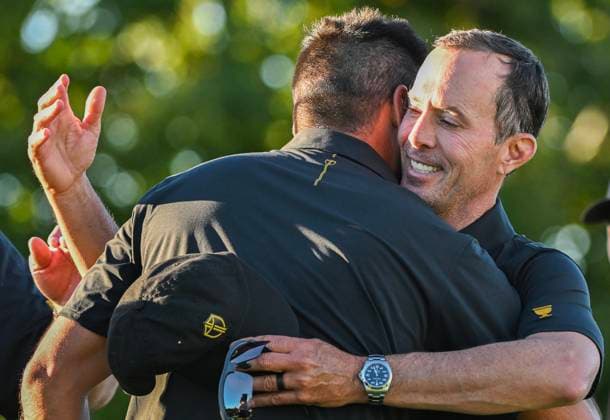 September 27, 2024, Montreal, Pq, Canada: International team captain Mike Weir, right, hugs player Jason Day of Australia following their second round foursome match at the Presidents Cup golf tournament at the Royal Montreal Golf Club in Montreal, Friday, Sept. 27, 2024. Mike Weir, Jason Day, - ZUMAc35_ 20240927_zaf_c35_177 Copyright: xGrahamxHughesx