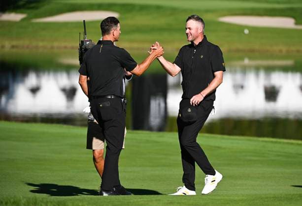 September 27, 2024, Montreal, Pq, Canada: International team members Taylor Pendrith, right, of Canada and Adam Scott of Australia, celebrate on the 14th green during a foursome match at the Presidents Cup golf tournament at the Royal Montreal Golf Club in Montreal, Friday, Sept. 27, 2024. Taylor Pendrith, Adam Scott, - ZUMAc35_ 20240927_zaf_c35_178 Copyright: xGrahamxHughesx