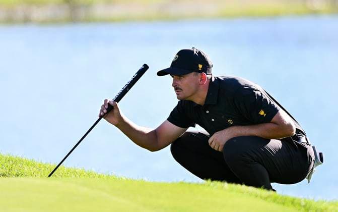 September 27, 2024, Montreal, Pq, Canada: International team member Christiaan Bezuidenhout of South Africa lines up a putt on the 15th green during their second round foursome match at the Presidents Cup golf tournament at the Royal Montreal Golf Club in Montreal, Friday, Sept. 27, 2024. Christiaan Bezuidenhout,  - ZUMAc35_ 20240927_zaf_c35_182 Copyright: xGrahamxHughesx