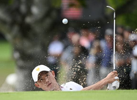 Sport Bilder des Tages September 27, 2024, Montreal, Pq, Canada: United States team member Collin Morikawa hits out of a bunker on the 2nd hole during second round foursome match at the Presidents Cup golf tournament at Royal Montreal Golf Club Friday, September 27, 2024 in Montreal. Collin Morikawa  - ZUMAc35_ 20240927_zaf_c35_185 Copyright: xGrahamxHughesx