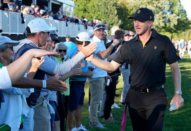 September 27, 2024, Montreal, Pq, Canada: International team member Mackenzie Hughes of Canada, high fives fans on the 16th hole during second round foursome match at the Presidents Cup golf tournament at Royal Montreal Golf Club Friday, September 27, 2024 in Montreal. Mackenzie Hughes,  - ZUMAc35_ 20240927_zaf_c35_187 Copyright: xFrankxGunnx