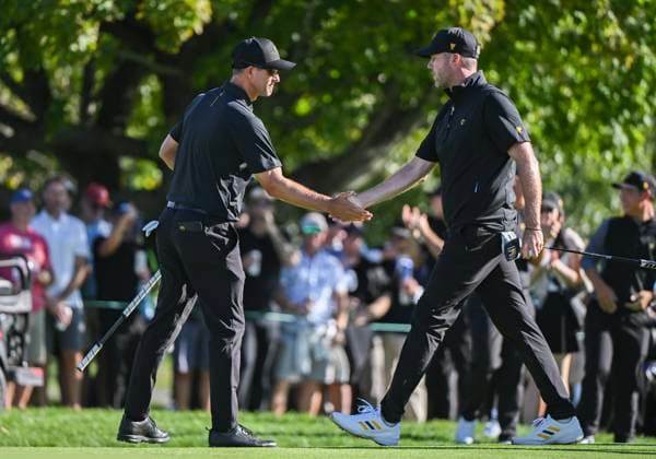 September 27, 2024, Montreal, Pq, Canada: International team members Adam Scott of Australia, left, and Taylor Pendrith of Canada react on the 12th hole during their second round foursome match at the Presidents Cup golf tournament at the Royal Montreal Golf Club in Montreal, Friday, Sept. 27, 2024. Adam Scott, Taylor Pendrith, - ZUMAc35_ 20240927_zaf_c35_204 Copyright: xGrahamxHughesx