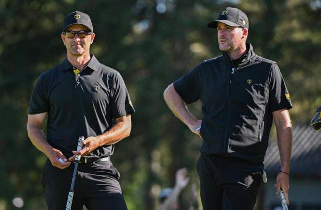September 27, 2024, Montreal, Pq, Canada: International team members Adam Scott of Australia, left, and Taylor Pendrith of Canada look on during their second round foursome match at the Presidents Cup golf tournament at the Royal Montreal Golf Club in Montreal, Friday, Sept. 27, 2024. Adam Scott, Taylor Pendrith, - ZUMAc35_ 20240927_zaf_c35_205 Copyright: xGrahamxHughesx
