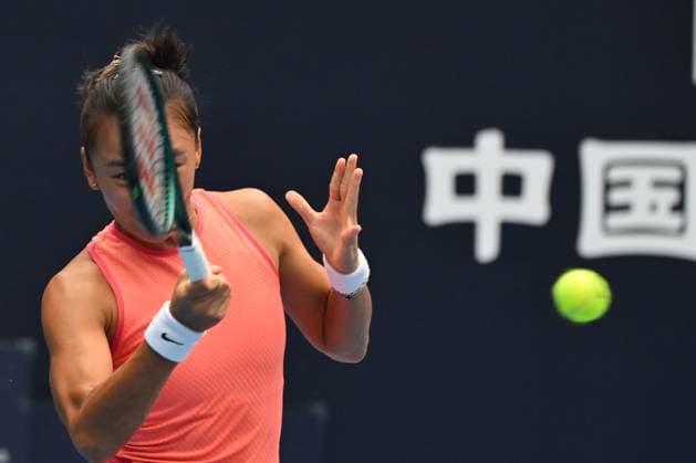 (240928) -- BEIJING, Sept. 28, 2024 -- Yuan Yue of China returns a shot during the women s singles second round match between Karolina Muchova of the Czech Republic and Yuan Yue of China at 2024 China Open tennis tournament in Beijing, capital of China, Sept. 28, 2024. ) (SP)CHINA-BEIJING-TENNIS-CHINA OPEN-WOMEN S SINGLES-SECOND ROUND (CN) ZhangxLong 