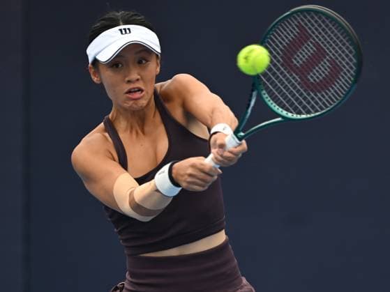 (240928) -- BEIJING, Sept. 28, 2024 -- Wei Sijia of China hits a return during the women s singles second round match between Wei Sijia of China and Beatriz Haddad Maia of Brazil at 2024 China Open tennis tournament in Beijing, capital of China, Sept. 28, 2024. ) (SP)CHINA-BEIJING-TENNIS-CHINA OPEN-WOMEN S SINGLES (CN) ZhangxLong 