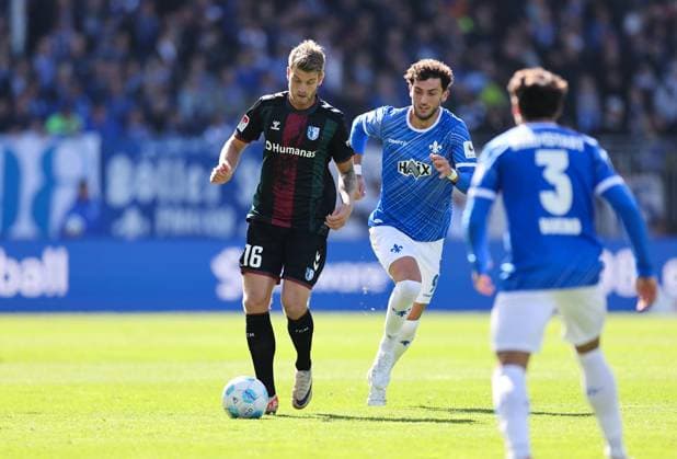 28 09 2024, xdcx, Soccer 2 Bundesliga, SV Darmstadt 98 1 FC Magdeburg, emonline, emspor, despor, v l , Marcus Mathisen 1 FC Magdeburg , Fraser Hornby SV Darmstadt 98 DFL DFB REGULATIONS PROHIBIT ANY USE OF PHOTOGRAPHS AS IMAGE SEQUENCES AND OR QUASI VIDEO Copyright: HMBxMedia Claus