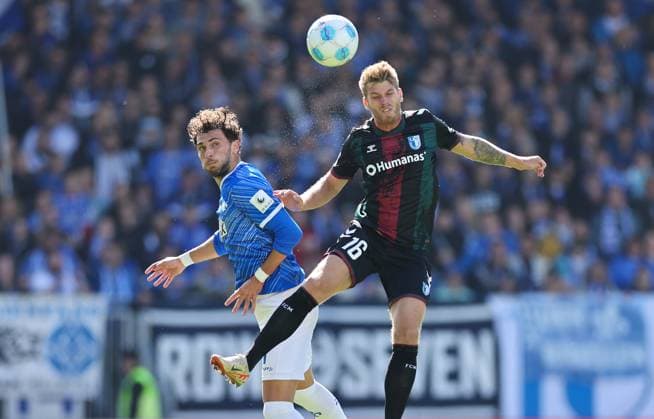 28 09 2024, xdcx, Soccer 2 Bundesliga, SV Darmstadt 98 1 FC Magdeburg, emonline, emspor, despor, v l , Fraser Hornby SV Darmstadt 98 , Marcus Mathisen 1 FC Magdeburg DFL DFB REGULATIONS PROHIBIT ANY USE OF PHOTOGRAPHS AS IMAGE SEQUENCES AND OR QUASI VIDEO Copyright: HMBxMedia Claus