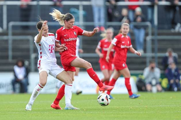 Sara Agrez 1 FC Koeln and Eileen Campbell SC Freiburg battle for the ball during the Woman Bundesliga match between 1 FC Koeln and SC Freiburg at Franz Kremer Stadion on September 28, 2024 in Cologne, Germany, Germany Photo by Oliver Kaelke DeFodi Images Sara Agrez 1 FC Koeln and Eileen Campbell SC Freiburg battle for the ball during the Woman Bundesliga match between 1 FC Köln and SC Freiburg at Franz Kremer Stadion on September 28, 2024 in Köln, Germany Photo by Oliver Kaelke DeFodi Images DFL regulations prohibit any use of photographs as image sequences and or quasi video Defodi 003 678 2024 09 28 OK KOESCF 1162 1 Defodi-003 DFL regulations prohibit any use of photographs as image sequences and or quasi-video.