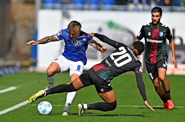 28 09 2024, xfux, Fussball 2 Bundesliga, SV Darmstadt 98 1 FC Magdeburg, v l Luca Marseiler SV Darmstadt 98 , Xavier Amaechi 1 FC Magdeburg DFL DFB REGULATIONS PROHIBIT ANY USE OF PHOTOGRAPHS as IMAGE SEQUENCES and or QUASI VIDEO Licensing of the photographic work to and or by SV Darmstadt 1898 e V as well as subsidiaries is not permitted No release of or sale to SV Darmstadt 1898 e V Darmstadt