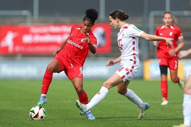 Shekiera Martinez SC Freiburg and Sara Agrez 1 FC Koeln in a duel during the Woman Bundesliga match between 1 FC Köln and SC Freiburg, Franz Kremer Stadion on September 28, 2024 in Cologne, Germany Photo by Oliver Kaelke DeFodi Images Shekiera Martinez SC Freiburg and Sara Agrez 1 FC Koeln battle for the ball during the Woman Bundesliga match between 1 FC Köln and SC Freiburg at Franz Kremer Stadion on September 28, 2024 in Köln, Germany Photo by Oliver Kaelke DeFodi Images DFL regulations prohibit any use of photographs as image sequences and or quasi video Defodi 003 678 2024 09 28 OK KOESCF 0912 Defodi-003 DFL regulations prohibit any use of photographs as image sequences and or quasi-video.
