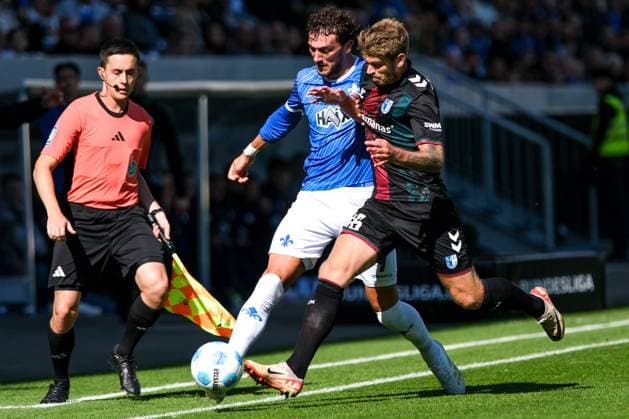 Fraser Hornby SV Darmstadt 98, 09 in duel with Marcus Mathisen 1 FC Magdeburg, 16 , GER, SV Darmstadt 98 vs 1 FC Magdeburg, Soccer, 2 Bundesliga, Matchday 7, Season 2024 2025, 28 09 2024 DFL REGULATIONS PROHIBIT ANY USE OF PHOTOGRAPHS as IMAGE SEQUENCES and or QUASI VIDEO GER, SV Darmstadt 98 vs 1 FC Magdeburg, Football, 2 Bundesliga, Matchday 7, Season 2024 2025, 28 09 2024 Darmsatdt Copyright: xEibner-Pressefoto FlorianxWieganx EP_FWD