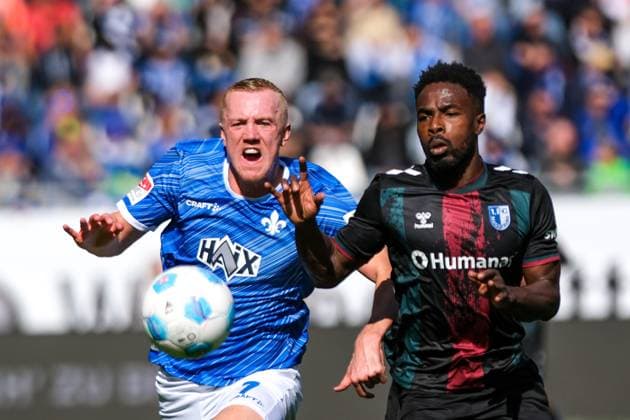 Isac Lidberg SV Darmstadt 98, 07 in duel with Daniel Heber 1 FC Magdeburg, 15 , GER, SV Darmstadt 98 vs 1 FC Magdeburg, Soccer, 2 Bundesliga, Matchday 7, Season 2024 2025, 28 09 2024 DFL REGULATIONS PROHIBIT ANY USE OF PHOTOGRAPHS as IMAGE SEQUENCES and or QUASI VIDEO GER, SV Darmstadt 98 vs 1 FC Magdeburg, Football, 2 Bundesliga, Matchday 7, Season 2024 2025, 28 09 2024 Darmsatdt Copyright: xEibner-Pressefoto FlorianxWieganx EP_FWD
