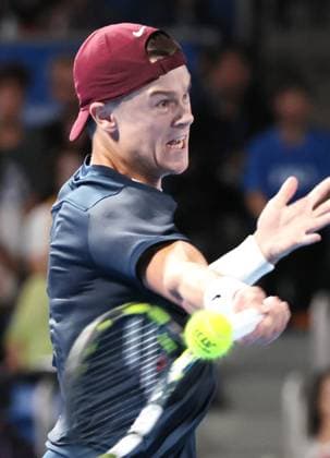 September 28, 2024, Tokyo, Japan - Holger Rune of Denmark retuens the ball against Yoshihito Nishioka of Japan at the second round match of the Japan Open Tennis championships at the Ariake Colosseum in Tokyo on Saturday, September 28, 2024. (photo by Yoshio Tsunoda AFLO) Noxthirdxpartyxsales  (0765382991st)