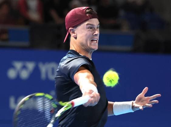 September 28, 2024, Tokyo, Japan - Holger Rune of Denmark retuens the ball against Yoshihito Nishioka of Japan at the second round match of the Japan Open Tennis championships at the Ariake Colosseum in Tokyo on Saturday, September 28, 2024. (photo by Yoshio Tsunoda AFLO) Noxthirdxpartyxsales  (0765382994st)