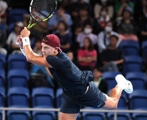 September 28, 2024, Tokyo, Japan - Holger Rune of Denmark retuens the ball against Yoshihito Nishioka of Japan at the second round match of the Japan Open Tennis championships at the Ariake Colosseum in Tokyo on Saturday, September 28, 2024. (photo by Yoshio Tsunoda AFLO) Noxthirdxpartyxsales  (0765382997st)