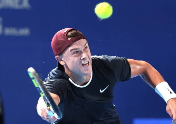 September 28, 2024, Tokyo, Japan - Holger Rune of Denmark retuens the ball against Yoshihito Nishioka of Japan at the second round match of the Japan Open Tennis championships at the Ariake Colosseum in Tokyo on Saturday, September 28, 2024. (photo by Yoshio Tsunoda AFLO) Noxthirdxpartyxsales  (0765383000st)