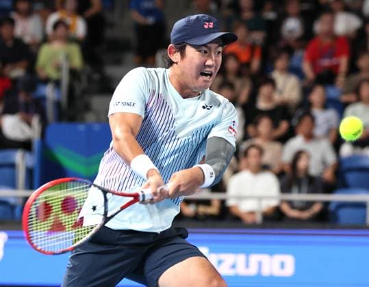 September 28, 2024, Tokyo, Japan - Japan s Yoshihito Nishioka retuens the ball against Holger Rune of Denmark at the second round match of the Japan Open Tennis championships at the Ariake Colosseum in Tokyo on Saturday, September 28, 2024. (photo by Yoshio Tsunoda AFLO) Noxthirdxpartyxsales  (0765383011st)