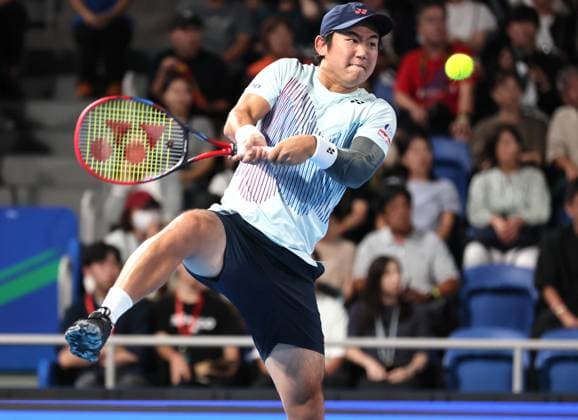 September 28, 2024, Tokyo, Japan - Japan s Yoshihito Nishioka retuens the ball against Holger Rune of Denmark at the second round match of the Japan Open Tennis championships at the Ariake Colosseum in Tokyo on Saturday, September 28, 2024. (photo by Yoshio Tsunoda AFLO) Noxthirdxpartyxsales  (0765383015st)