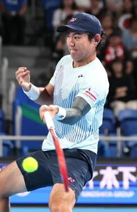 September 28, 2024, Tokyo, Japan - Japan s Yoshihito Nishioka retuens the ball against Holger Rune of Denmark at the second round match of the Japan Open Tennis championships at the Ariake Colosseum in Tokyo on Saturday, September 28, 2024. (photo by Yoshio Tsunoda AFLO) Noxthirdxpartyxsales  (0765383021st)