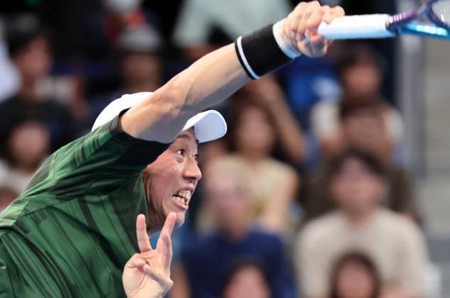 September 28, 2024, Tokyo, Japan - Kei Nishikori of Japan retuens delivers a servicel against Jordan Thompson of Australia at the second round match of the Japan Open Tennis championships at the Ariake Colosseum in Tokyo on Saturday, September 28, 2024. (photo by Yoshio Tsunoda AFLO) Noxthirdxpartyxsales  (0765383779st)