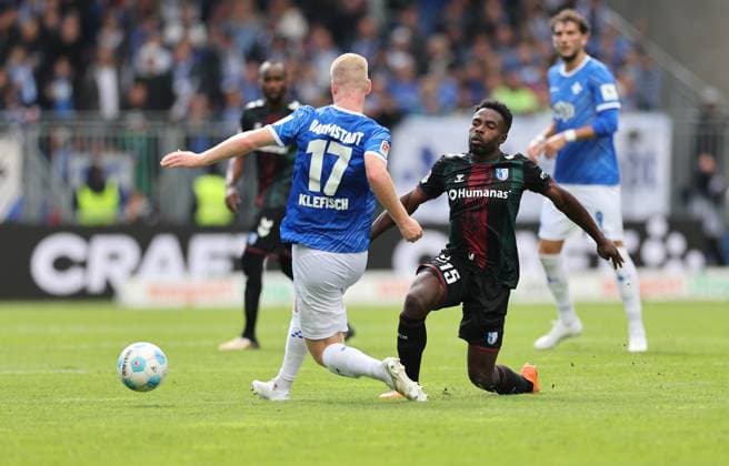 28 09 2024, xdcx, Soccer 2 Bundesliga, SV Darmstadt 98 1 FC Magdeburg, emonline, emspor, despor, v l , Kai Klefisch SV Darmstadt 98 , Daniel Heber 1 FC Magdeburg DFL DFB REGULATIONS PROHIBIT ANY USE OF PHOTOGRAPHS AS IMAGE SEQUENCES AND OR QUASI VIDEO Copyright: HMBxMedia Claus