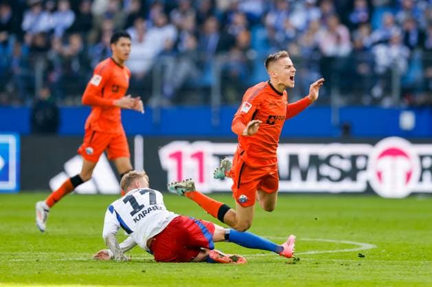 Hamburg, 28 September 2024 Football, 2 Bundesliga 2024 25, Hamburger SV SC Paderborn 07 Adam Karabec Hamburger SV, 17 , Filip Bilbija SC Paderborn 07, 7 DFL REGULATIONS PROHIBIT ANY USE OF PHOTOGRAPHS AS IMAGE SEQUENCES AND OR QUASI VIDEO