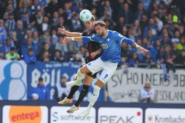 28 09 2024, xtvx, Fußball 2 Bundesliga, SV Darmstadt 98 1 FC Magdeburg emspor, v l Marcus Mathisen 1 FC Magdeburg Fraser Hornby SV Darmstadt 98 Zweikampf, Duell, duel, tackle, compete DFL DFB REGULATIONS PROHIBIT ANY USE OF PHOTOGRAPHS as IMAGE SEQUENCES and or QUASI VIDEO Darmstadt