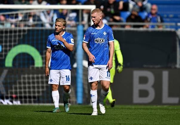 28 09 2024, xfux, Fußball 2 Bundesliga, SV Darmstadt 98 1 FC Magdeburg, v l Andreas Mueller Müller SV Darmstadt 98 , Kai Klefisch SV Darmstadt 98 enttaeuscht, enttaeuscht looking, dissapointed DFL DFB REGULATIONS PROHIBIT ANY USE OF PHOTOGRAPHS as IMAGE SEQUENCES and or QUASI VIDEO Licensing of the photographic work to and or by SV Darmstadt 1898 e V and subsidiaries is not permitted No release of or sale to SV Darmstadt 1898 e V Darmstadt