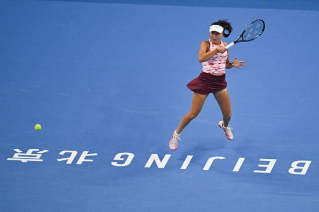 (240928) -- BEIJING, Sept. 28, 2024 -- Kamilla Rakhimova hits a return during the women s singles second round match between Zheng Qinwen of China and Kamilla Rakhimova of Russia at 2024 China Open tennis tournament in Beijing, capital of China, Sept. 28, 2024. ) (SP)CHINA-BEIJING-TENNIS-CHINA OPEN-WOMEN S SINGLES (CN) ZhangxLong 
