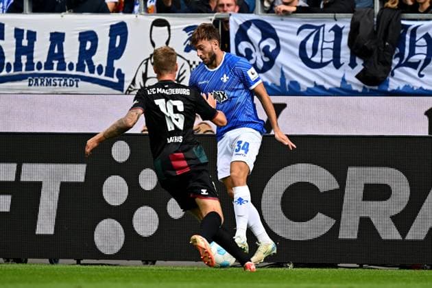 28 09 2024, xfux, Fussball 2 Bundesliga, SV Darmstadt 98 1 FC Magdeburg, v l Marcus Mathisen 1 FC Magdeburg , Killian Corredor SV Darmstadt 98 DFL DFB REGULATIONS PROHIBIT ANY USE OF PHOTOGRAPHS as IMAGE SEQUENCES and or QUASI VIDEO Licensing of the photographic work to and or by SV Darmstadt 1898 e V as well as subsidiaries is not permitted No release of or sale to SV Darmstadt 1898 e V Darmstadt