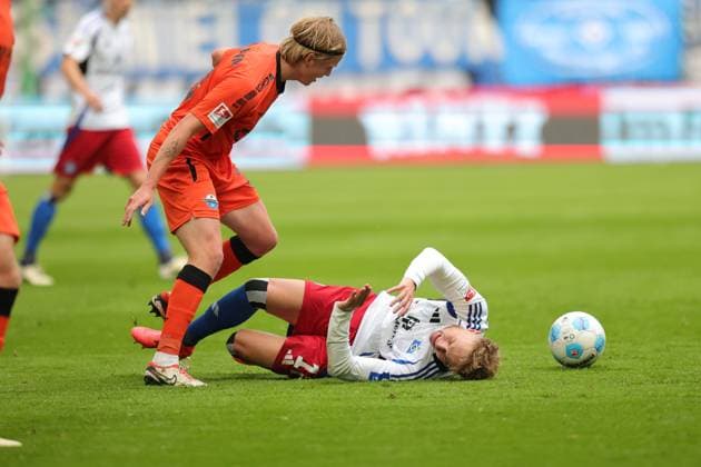 GER,Hamburg, Fußball, DFB, Hamburger SV vs SC Paderborn, im Hamburger Volksparkstadion , 28 09 2024, v l Adam Karabec Hamburger SV lies injured on the ground DFL regulations prohibit any use of photographs as image sequences and or quasi video Copyright: HMBxMedia FernandoxSoares