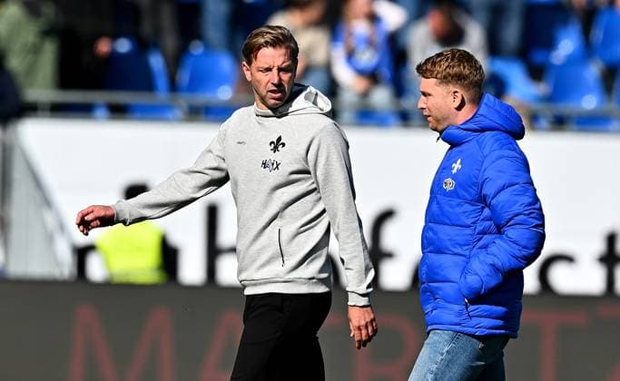28 09 2024, xfux, Fussball 2 Bundesliga, SV Darmstadt 98 1 FC Magdeburg, v l Trainer Florian Kohfeldt SV Darmstadt 98 , Sporting Director Paul Fernie SV Darmstadt 98 DFL DFB REGULATIONS PROHIBIT ANY USE OF PHOTOGRAPHS as IMAGE SEQUENCES and or QUASI VIDEO Licensing of the photographic work to and or by SV Darmstadt 1898 e V and subsidiaries is not permitted No release of or sale to SV Darmstadt 1898 e V Darmstadt