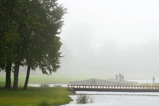 September 28, 2024, Montreal, Qc, CANADA: People walk the golf course in a fog delay during third round four-ball match play at the Presidents Cup golf tournament at the Royal Montreal Golf Club, in Montreal, Saturday, Sept. 28, 2024. Canada News - September 28, 2024  - ZUMAc35_ 20240928_zaf_c35_001 Copyright: xNathanxDenettex