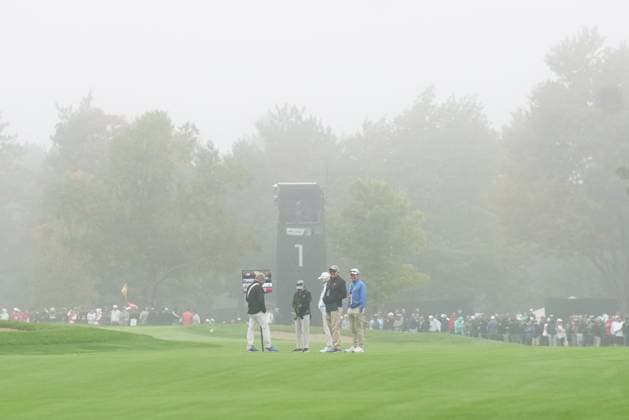 September 28, 2024, Montreal, Pq, Canada: Course officials monitor the situation during a fog delay during third round four-ball play at the Presidents Cup golf tournament at Royal Montreal Golf Club, in Montreal, Saturday, Sept. 28, 2024. Canada News - September 28, 2024  - ZUMAc35_ 20240928_zaf_c35_002 Copyright: xNathanxDenettex