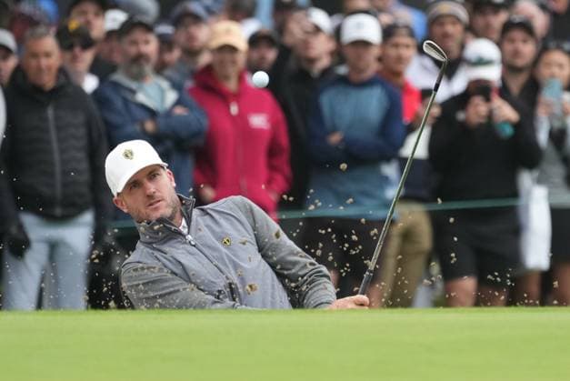 September 28, 2024, Montreal, Pq, Canada: International team member Adam Scott of Australia, hits out of the bunker on the fourth hole during third round four-ball match at the Presidents Cup golf tournament at Royal Montreal Golf Club, in Montreal, Saturday, Sept. 28, 2024. Adam Scott  - ZUMAc35_ 20240928_zaf_c35_005 Copyright: xChristinnexMuschix