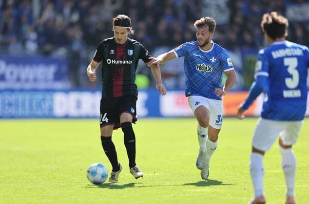 28 09 2024, xdcx, Soccer 2 Bundesliga, SV Darmstadt 98 1 FC Magdeburg, emonline, emspor, despor, v l , Jean Hugonet 1 FC Magdeburg , Killian Corredor SV Darmstadt 98 DFL DFB REGULATIONS PROHIBIT ANY USE OF PHOTOGRAPHS AS IMAGE SEQUENCES AND OR QUASI VIDEO Copyright: HMBxMedia Claus