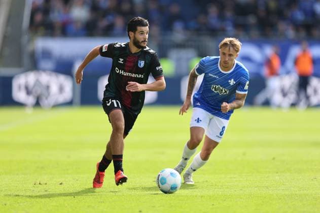 28 09 2024, xdcx, Soccer 2 Bundesliga, SV Darmstadt 98 1 FC Magdeburg, emonline, emspor, despor, v l , Mohammed El Hankouri 1 FC Magdeburg , Luca Marseiler SV Darmstadt 98 DFL DFB REGULATIONS PROHIBIT ANY USE OF PHOTOGRAPHS AS IMAGE SEQUENCES AND OR QUASI VIDEO Copyright: HMBxMedia Claus