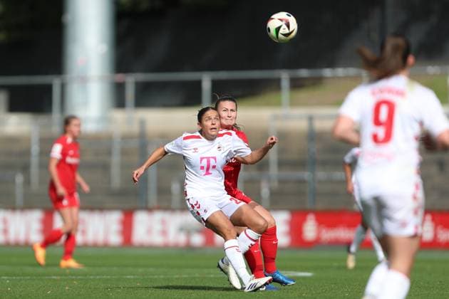 Laura Feiersinger 1 FC Koeln and Annabel Schasching SC Freiburg in a duel during the Woman Bundesliga match between 1 FC Köln and SC Freiburg, Franz Kremer Stadion on September 28, 2024 in Cologne, Germany, Germany Photo by Oliver Kaelke DeFodi Images Laura Feiersinger 1 FC Koeln and Annabel Schasching SC Freiburg battle for the ball during the Woman Bundesliga match between 1 FC Köln and SC Freiburg at Franz Kremer Stadion on September 28, 2024 in Köln, Germany Photo by Oliver Kaelke DeFodi Images DFL regulations prohibit any use of photographs as image sequences and or quasi video Defodi 003 678 2024 09 28 OK KOESCF 0243 Defodi-003 DFL regulations prohibit any use of photographs as image sequences and or quasi-video.