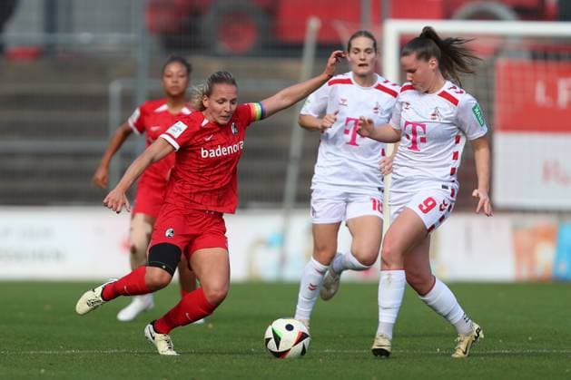 Lisa Karl SC Freiburg and Adriana Achcinska 1 FC Koeln in a duel during the Woman Bundesliga match between 1 FC Köln and SC Freiburg, Franz Kremer Stadion on September 28, 2024 in Cologne, Germany Photo by Oliver Kaelke DeFodi Images Lisa Karl SC Freiburg and Adriana Achcinska 1 FC Koeln battle for the ball during the Woman Bundesliga match between 1 FC Köln and SC Freiburg at Franz Kremer Stadion on September 28, 2024 in Köln, Germany Photo by Oliver Kaelke DeFodi Images DFL regulations prohibit any use of photographs as image sequences and or quasi video Defodi 003 678 2024 09 28 OK KOESCF 0319 Defodi-003 DFL regulations prohibit any use of photographs as image sequences and or quasi-video.