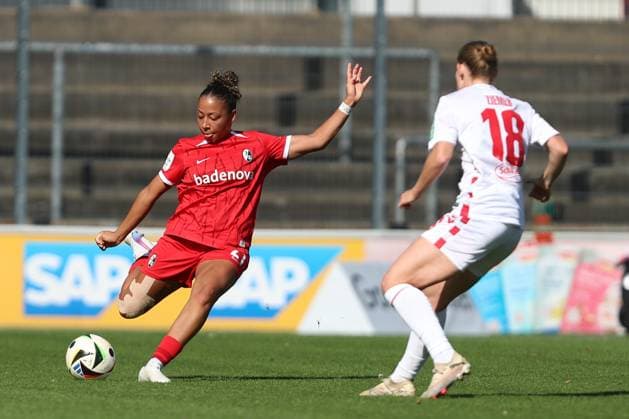 Nicole Ojukwu SC Freiburg in action, on the ball, single action during the Woman Bundesliga match between 1 FC Köln and SC Freiburg at Franz Kremer Stadion on September 28, 2024 in Cologne, Germany Germany Photo by Oliver Kaelke DeFodi Images Nicole Ojukwu SC Freiburg controls the ball during the Woman Bundesliga match between 1 FC Köln and SC Freiburg at Franz Kremer Stadion on September 28, 2024 in Köln, Germany Photo by Oliver Kaelke DeFodi Images DFL regulations prohibit any use of photographs as image sequences and or quasi video Defodi 003 678 2024 09 28 OK KOESCF 0596 Defodi-003 DFL regulations prohibit any use of photographs as image sequences and or quasi-video.